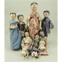 Collection of eight painted wooden peg dolls,1920s,
