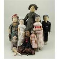 Collection of eight painted wooden peg dolls, 1920s,