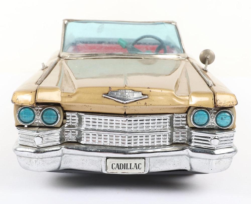 A Bandai battery operated 4025 Golden Cadillac Convertible A Bandai battery operated 4025 Golden Cadillac Convertible