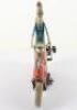 A rare and large George Levy Gely tinplate clockwork Motorbike with Lady pillion passenger, German 1930 - 6