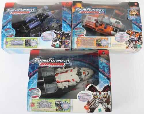 Three Hasbro Armada Transformer toys