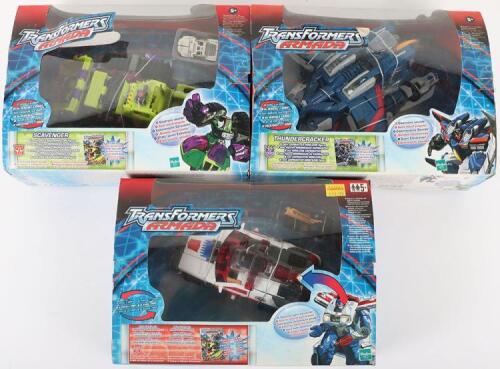 Three Hasbro Armada Transformer toys