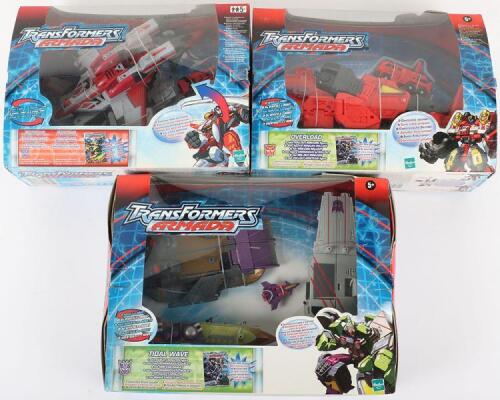 Three Hasbro Armada Transformer toys
