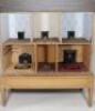 A fine and early English painted wooden dolls house on original stand, 1820s/30s, - 2