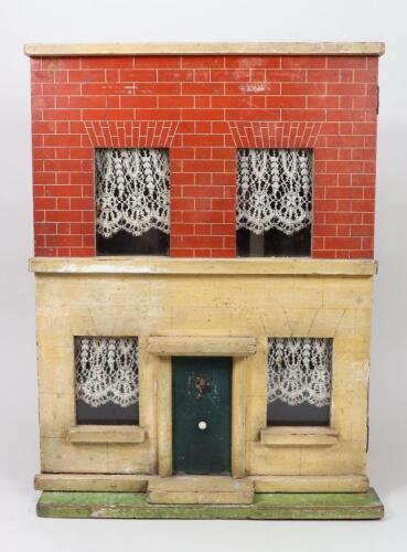 A Silber & Fleming painted wooden dolls house, circa 1890,