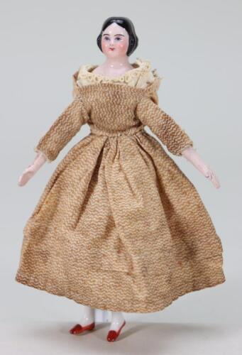 A miniature glazed china shoulder head doll on jointed wooden body, German mid 19th century,