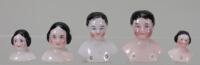 Five Early miniature glazed shoulder heads, German mid 19th century,
