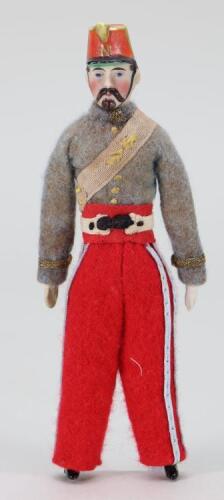 Miniature gentleman soldier bisque shoulder head doll with moulded hat and in Zouave uniform, German circa 1900,