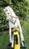 A painted and carved wooden G & J Lines Rocking Horse, English early 20th century, - 2