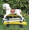 A painted and carved wooden G & J Lines Rocking Horse, English early 20th century, - 3