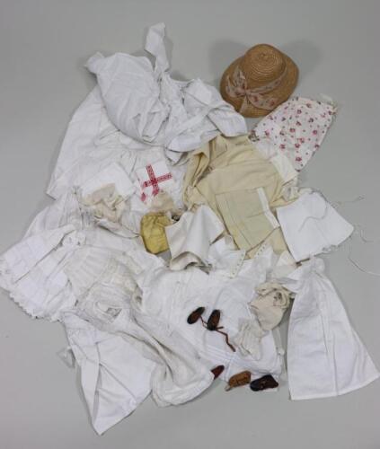 Collection of dolls clothes,