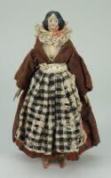 Early papier-mache shoulder head doll in original costume, German circa 1840,