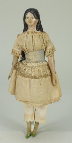 Early papier-mache shoulder head doll in original costume, German circa 1840,