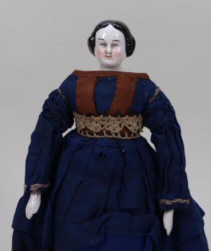 Early glazed china shoulder head doll, German, circa 1860s,