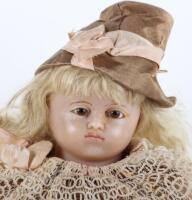 A good poured wax shoulder head doll in original clothing, 1870s,