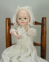 A wax over composition Mochmann baby with squeaker, German mid 19th century,