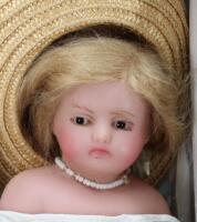 A poured wax shoulder head doll, probably Pierotti, English 1860,