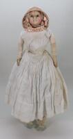 A wax over composition ‘Mad Alice’ shoulder head doll, English circa 1850,