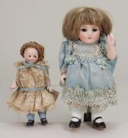 A Kling all-bisque child doll in original clothes, German circa 1910,