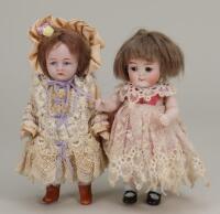 A Miniature all-bisque J.D Kestner 217 ‘Googly’ doll , German circa 1910,