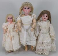 Three bisque head girl dolls, German circa 1910,