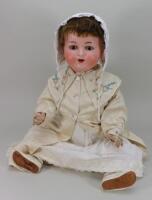 A Large A.M 990 bisque head baby doll,