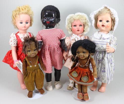 A collection of various dolls and Teddy bears,