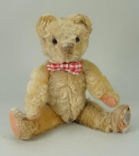 A charming white mohair Chad Valley Teddy bear, 1930s,