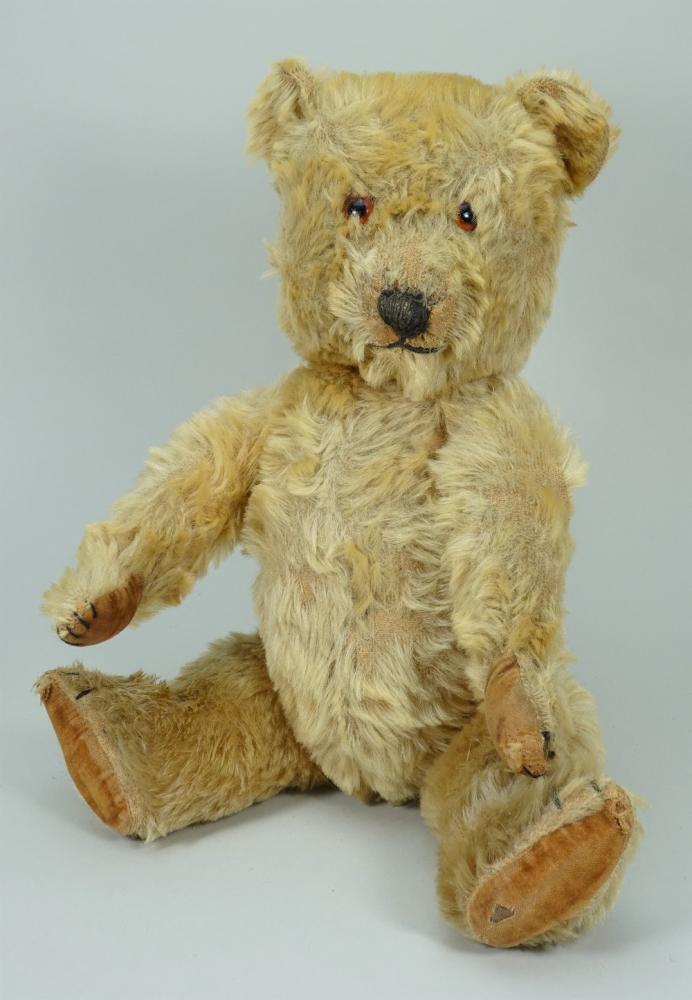 A golden mohair Chiltern musical Hugmee Teddy bear, 1950s,