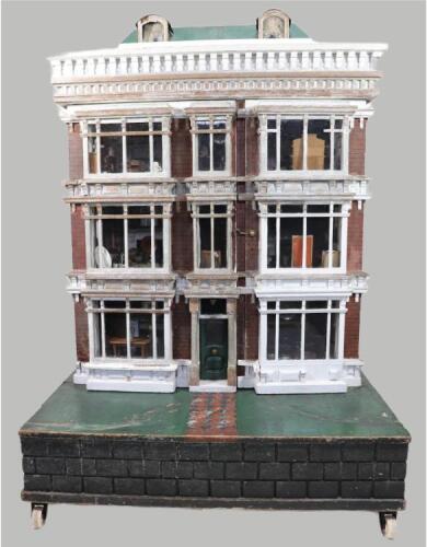 ‘Hartley Hall’ an imposing double fronted painted wooden dolls house, English circa 1875,