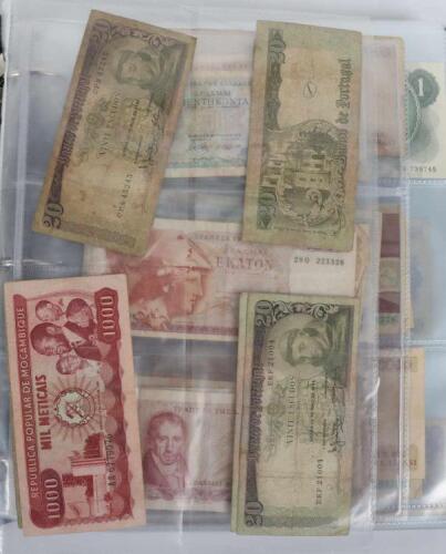 A folder of banknotes, including eighteen 10 Shillings, Bank of Indonesia, Japanese, Turkey