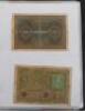 A folder of mostly German banknotes, including 1908 Reichsbanknote, 1910 1000 Reichsbanknote - 2