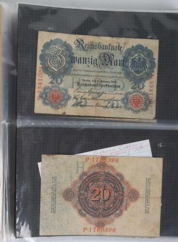 A folder of banknotes, including German, Italy, Egypt, Yogoslavia
