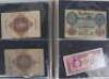 A folder of banknotes, including German, Italy, Egypt, Yogoslavia - 2