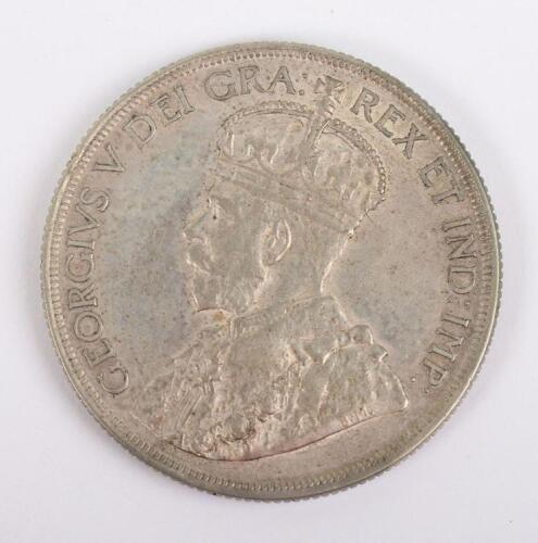 A rare Canada 1936 Dollar, JOP countermark