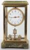 An early 20th century French Grivolas 400 day gilt metal and marble four glass bracket clock