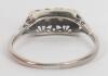 A white gold and four stone diamond ring - 5