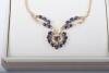 A 9ct gold and sapphire necklace with earrings