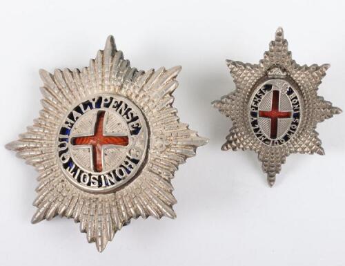 Two Coldstream Guards cap stars, both with lug fittings to the reverse.