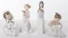 Four Nao porcelain figures