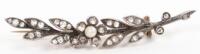 A diamond and pearl stylised leaf brooch