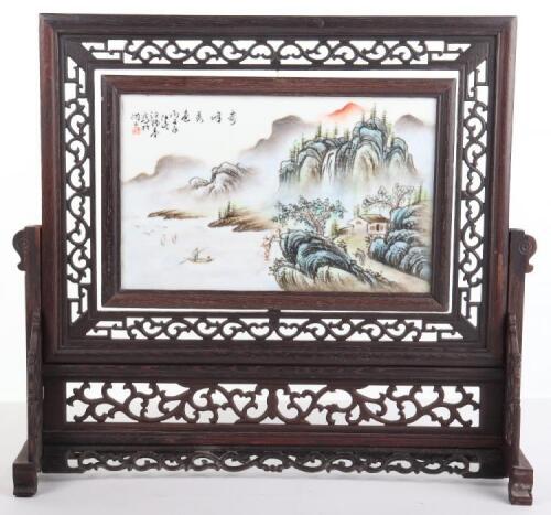 A late 19th/early 20th century Chinese porcelain handpainted table screen, on hardwood mount