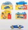 Four boxed Dinky vehicles