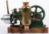 An interesting cast iron horizontal single cylinder petrol engine