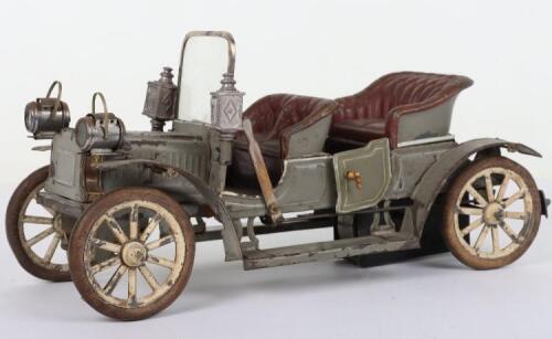 A Carette hand enamelled tinplate clockwork four-seater open Tourer, German circa 1910