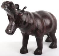 A leather bound model of a hippopotamus