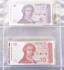 A folder of smaller banknotes - 2