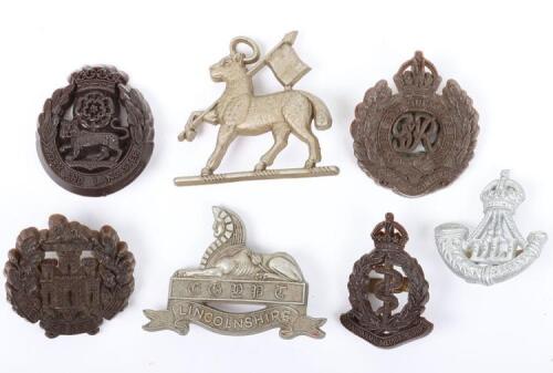 7x WW2 British War Economy Plastic Cap Badges