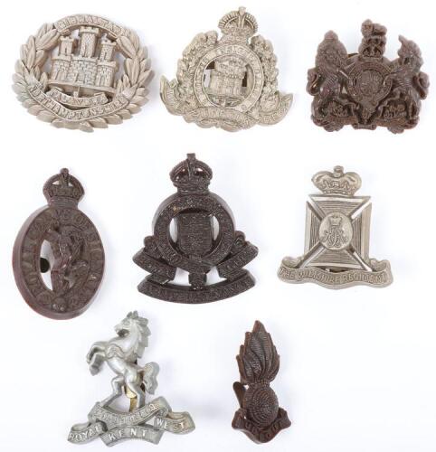 8x WW2 British War Economy Plastic Cap Badges