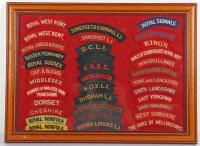 Framed Display of Cloth Shoulder Titles